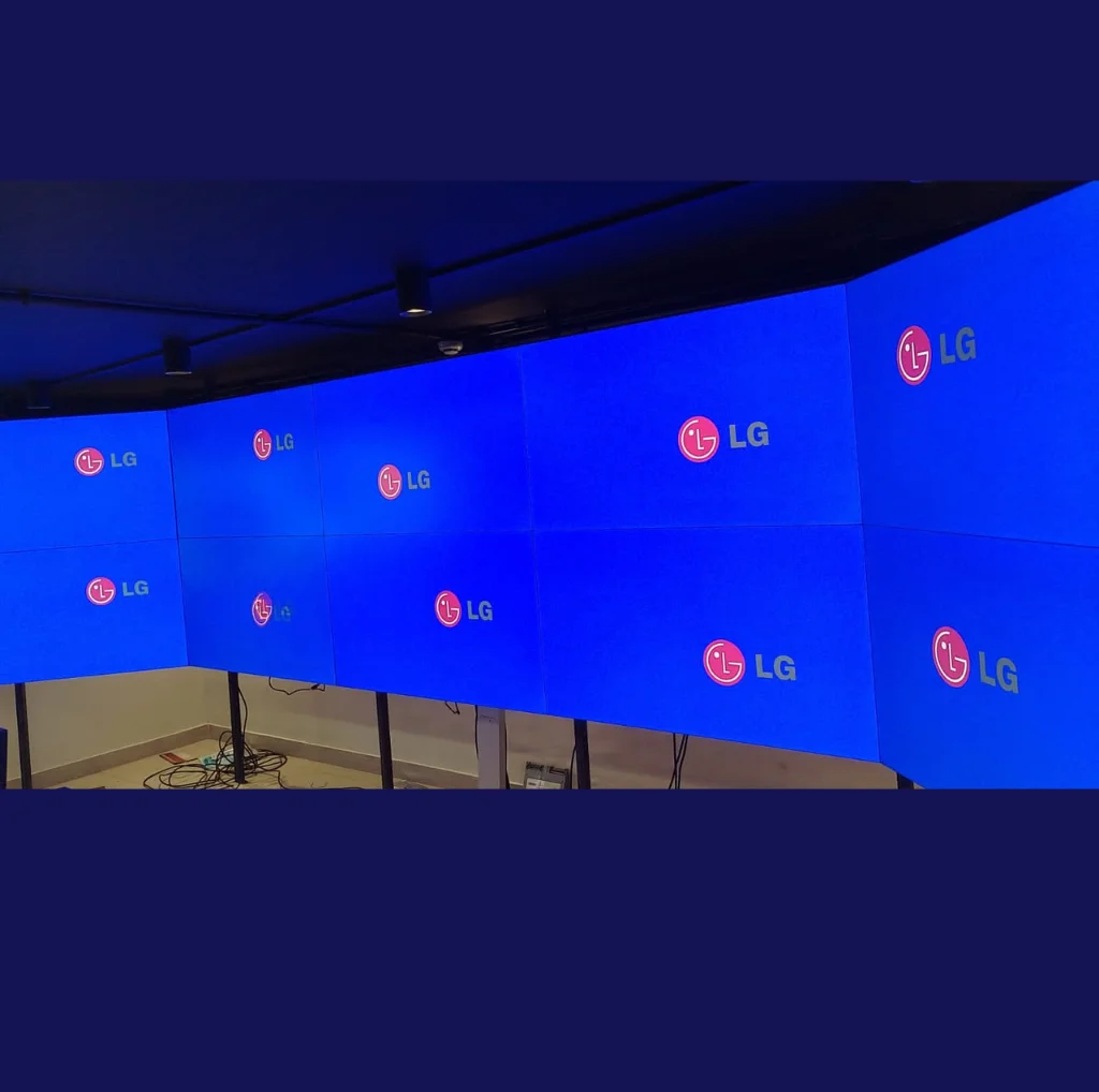 Video Wall panels are installed by using wall mounts. Screens are showing LG company logo.