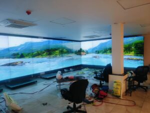 A large Indoor SMD Screen display showing beach view at PDMA office at Lahore. This complete solution provided by EziSol.
