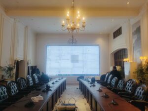 A conference room with a large LCD Video Wall screen displayed for presentations and meetings, Installed By EziSol.