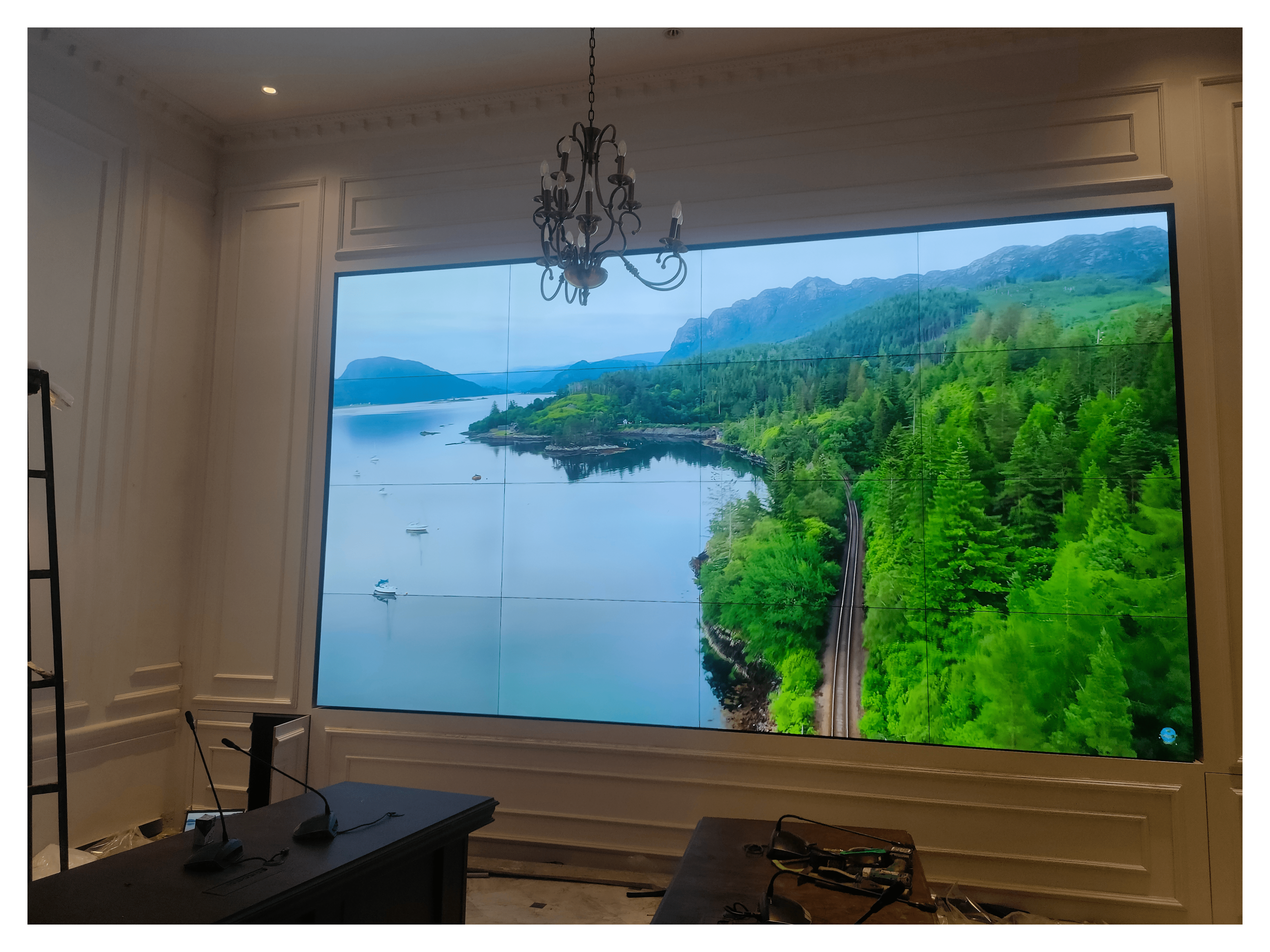 A 3x2 tiled LCD Video Wall display showing various images of beaches and greenery. Complete setup by EziSol