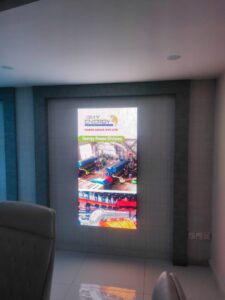  3 indoor Streamers of 3x5 feet in size are Displayed on a lobby wall. Complete setup by EziSol in Lahore. 